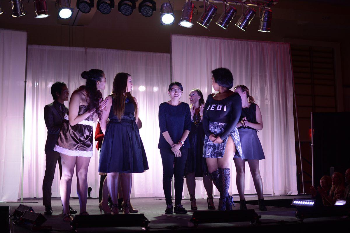 All of the Intermediate &amp; Beyond Designers stand on the stage during the naming of the winner of the African American Textile Society Fashion Expose, Thursday Evening, April 7, 2016. This was the 19th annual show and 16 designers participated in the show this year.