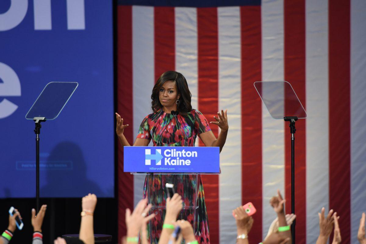 First Lady Michelle Obama speaking at the Clinton rally in Reynolds Coliseum. Obama urged the importance of voter registation and spoke of both candidates in the Presidential election.