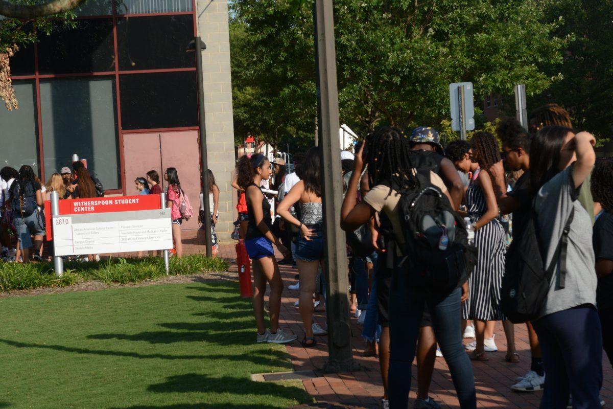 Students waited in line to check-in and receive tickets at the annual Back 2 School Jam.  