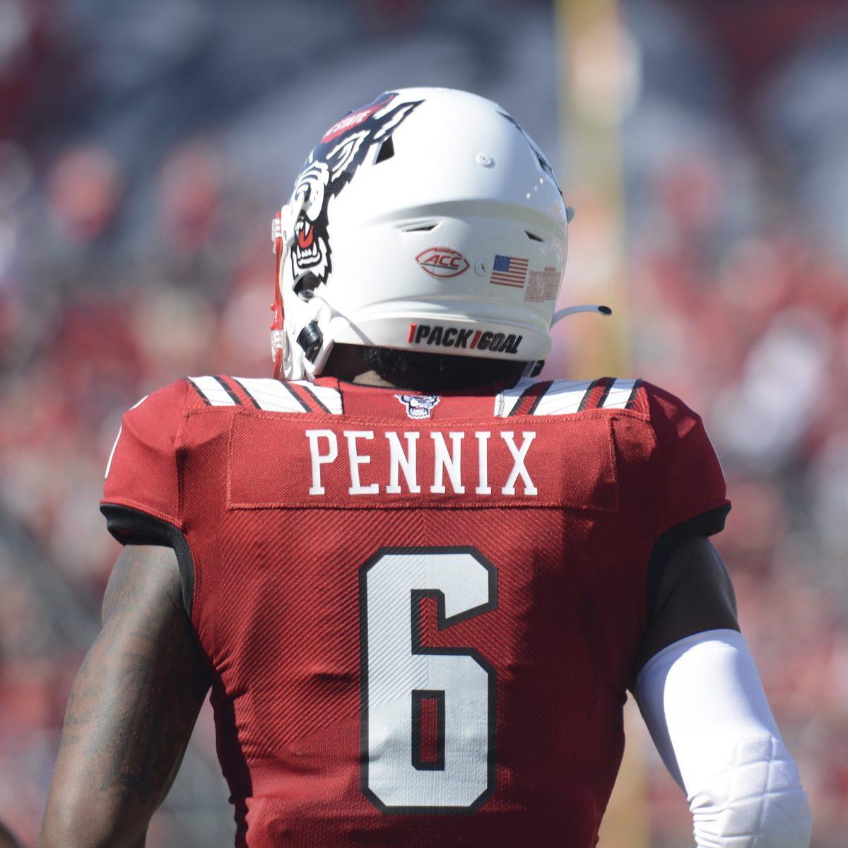 Redshirt sophomore running back Trent Pennix looks at the field after a play. The NC State Wolfpack defeated the Clemson Tigers 27-21 in double overtime at Carter-Finley Stadium on Sept. 25. Pennix had 11 receiving yards.