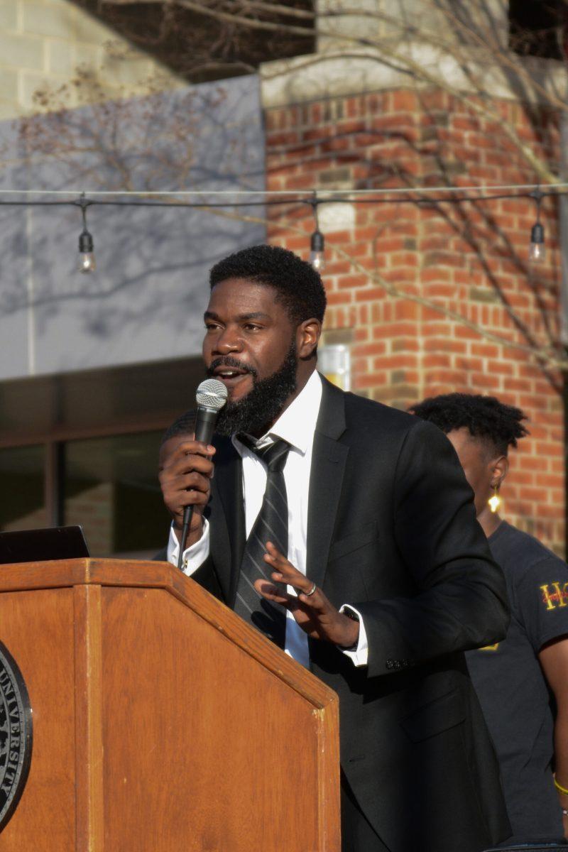 Reverend Paige speaks to the audience during the March like Martin event hosted by the African American Cultural Center from Stafford Commons to Harris Field on Friday, Feb. 25, 2022.