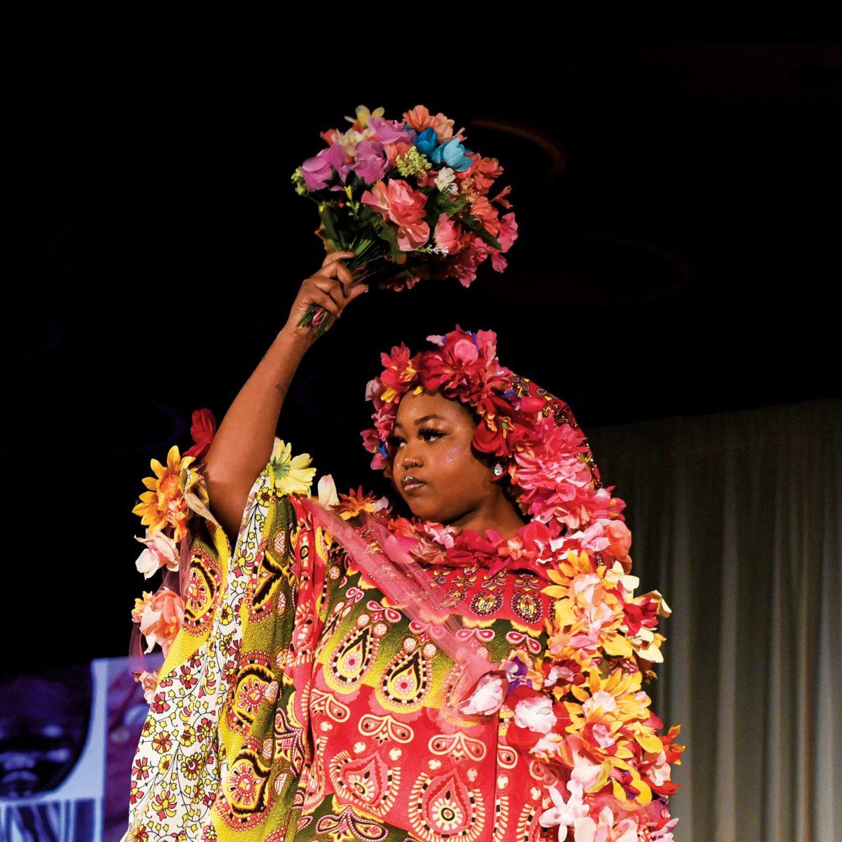 A model twirls to show off a design in Sahara Gar's collection, "Avant-Garde," at the 26th Annual Fashion Expose in the Talley Ballroom on April 8, 2024. The Expose was hosted by the African American Textile Society.