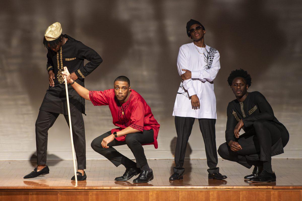 Student models show off their outfits during Africa Night in Nelson Hall on Friday, April 13, 2024. The African Student Union's event featured a fashion walk that showed off both traditional and modern African clothing.