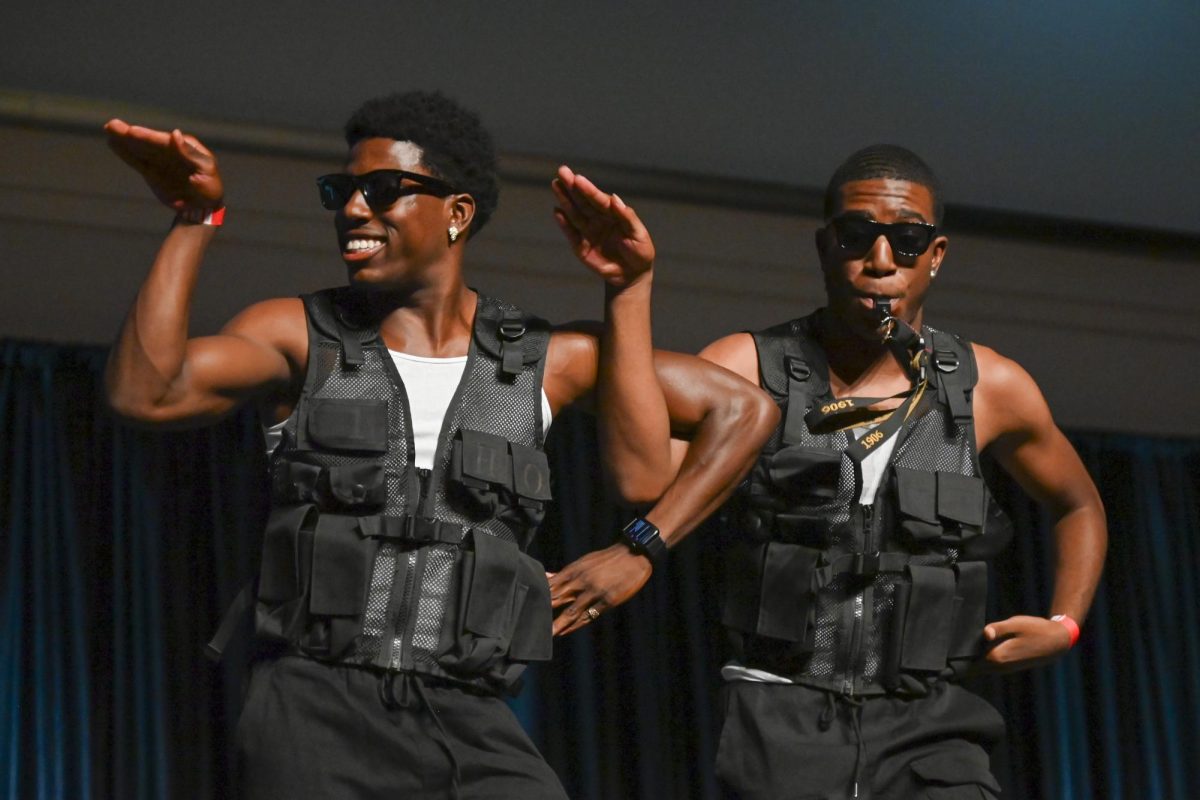 Lance Patterson, a third-year studying business administration, and Kaleb Hall, a third-year studying communications, performs with the Eta Omicron chapter of Alpha Phi Alpha Fraternity, Inc. during Back 2 School Jam in Talley Student Union on Monday, Aug. 19, 2024. 