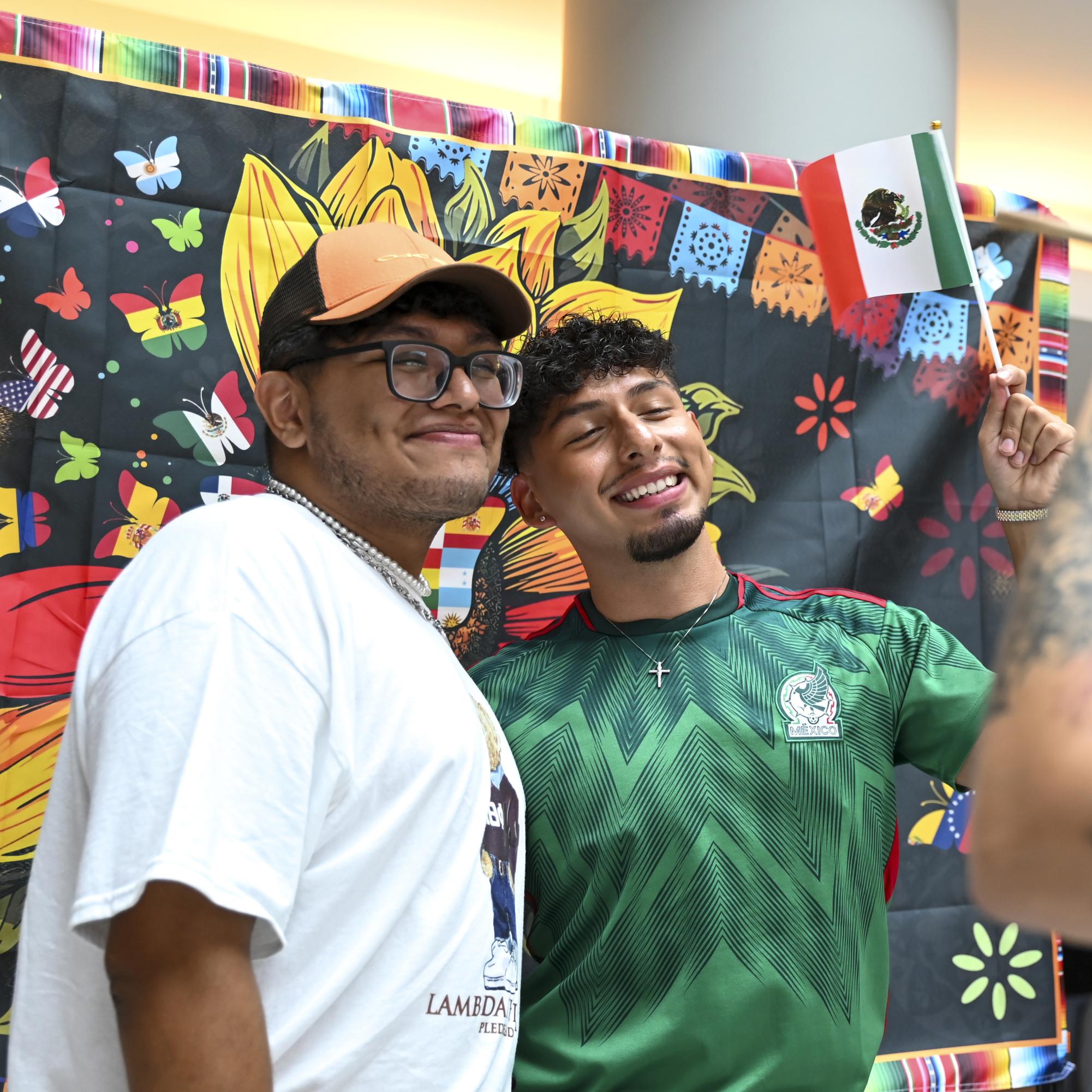 Travis Espinoza Mundo, a fourth-year studying education, and Yahir Sanchez-Vazquez, a third-year studying business management, poses for a picture during Multicultural Student Affair's Latinx Heritage Month Kickoff in Talley Student Union on Friday, Sept. 13, 2024.