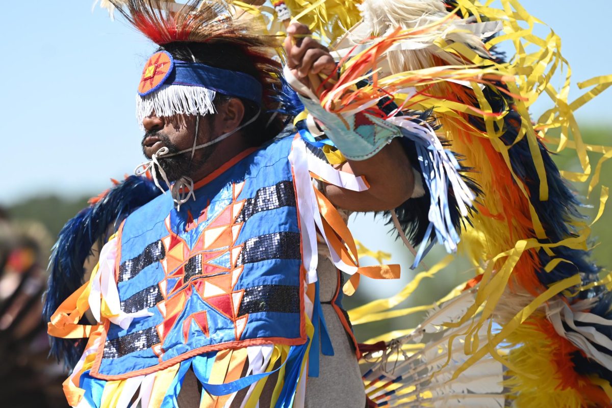 Nakoma IYaidden dances in his regalia at NC State's 33rd Annual Powwow on Saturday, March 30, 2024. This event featured Native business vendors, traditional drum groups and performances of different Indigenous dances.