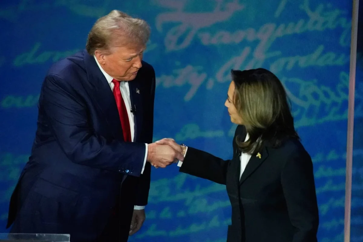 Photo of Harris and Trump shaking hands from Creative Commons