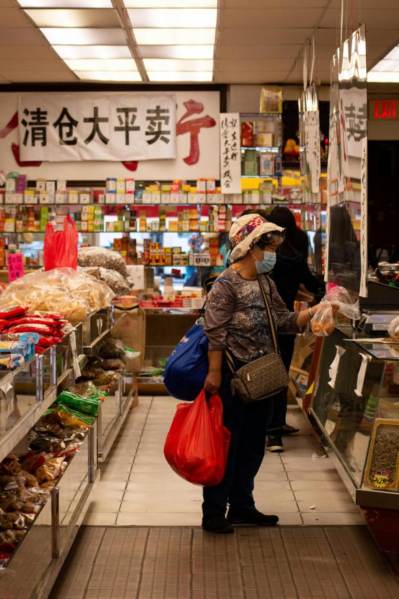 A Woman Standing in the Supermarket.