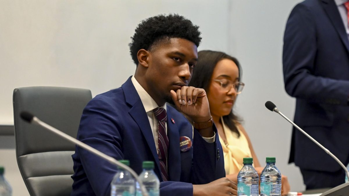Taquan Dewberry, a third-year studying philosophy and applied education and candidate for Student Body President, listens to the moderators during the Student Government Debates in the SG Governance Chamber in Talley Student Union on Monday, March 2, 2026. 
