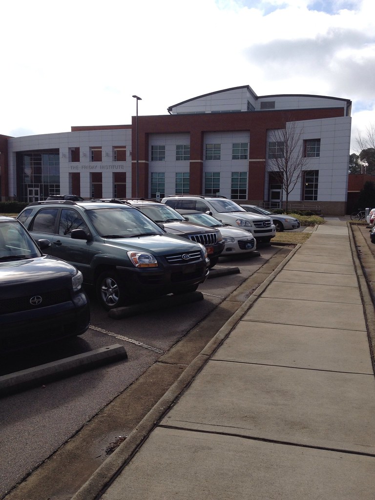 Cars parked in front of Friday Institute at NC State